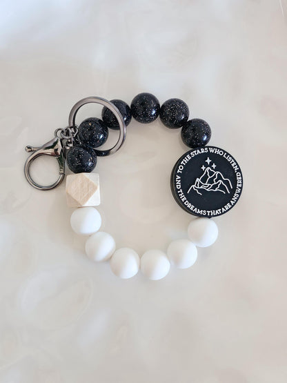 To The Stars Who Listen Wristlet Keychain