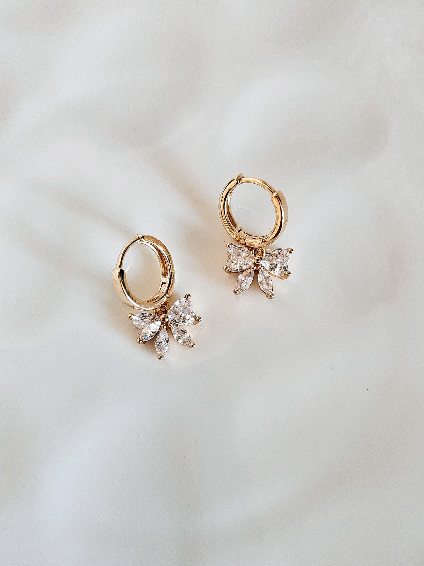 Isabelle | Crystal Bow Huggie Earrings