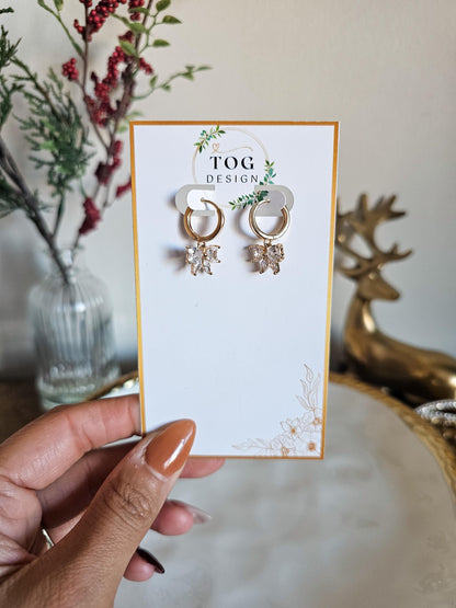Isabelle | Crystal Bow Huggie Earrings