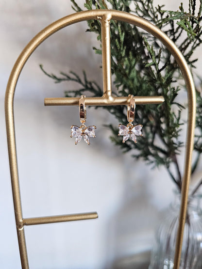 Isabelle | Crystal Bow Huggie Earrings